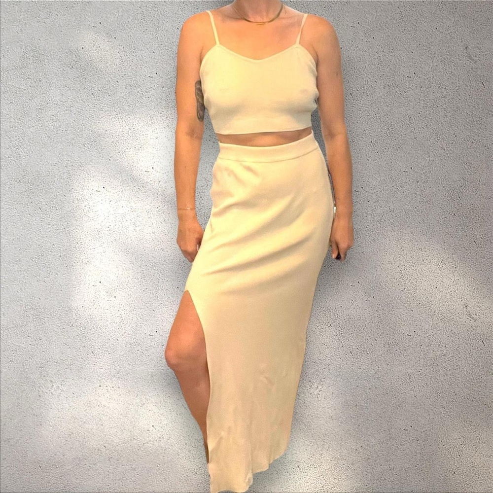 Large 2 piece cream sweater set. This set shown is too large for me.